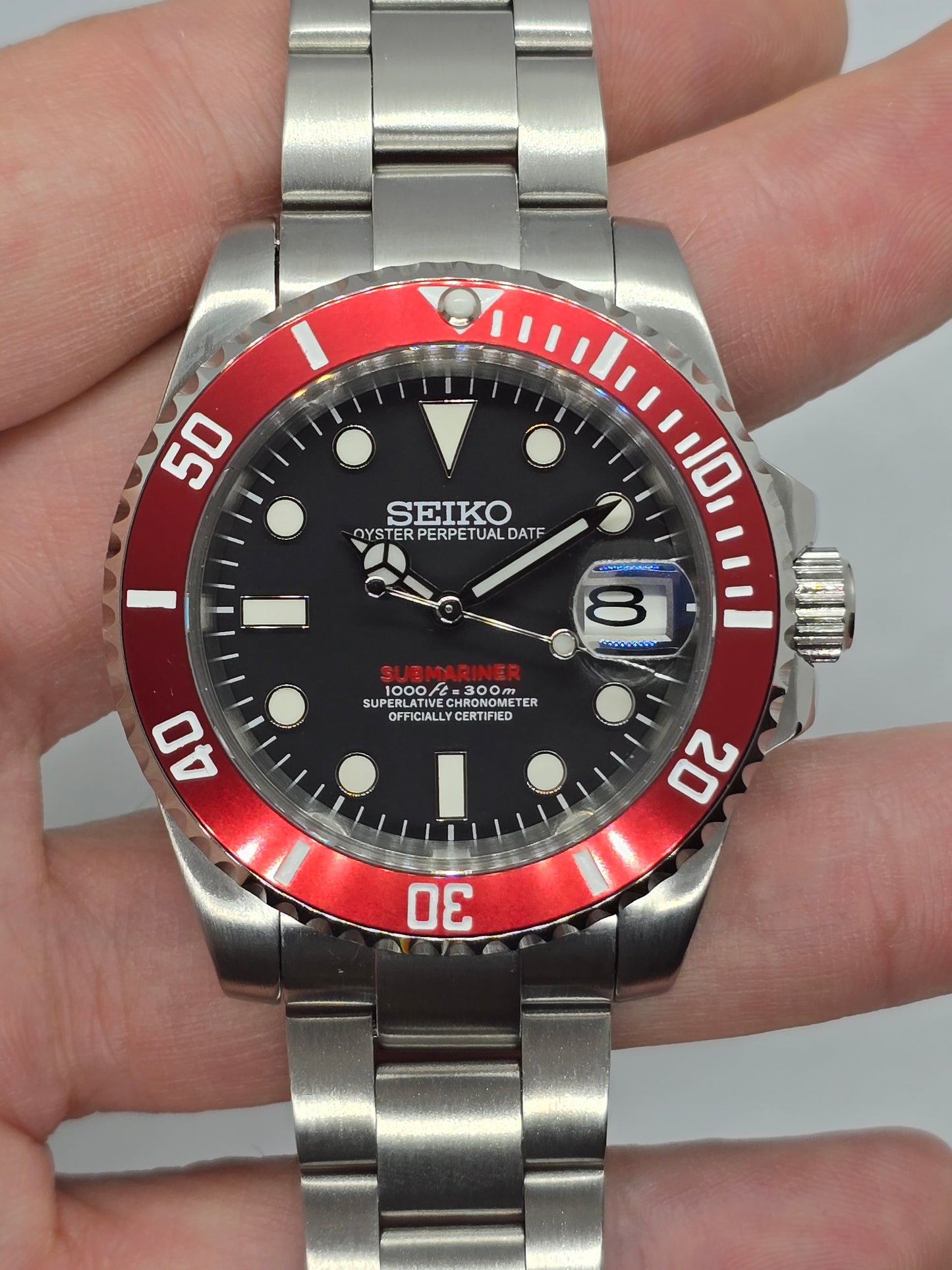 Seiko Mod Submariner Oyster Nh35 automatico 40mm lunetta rossa ceramica