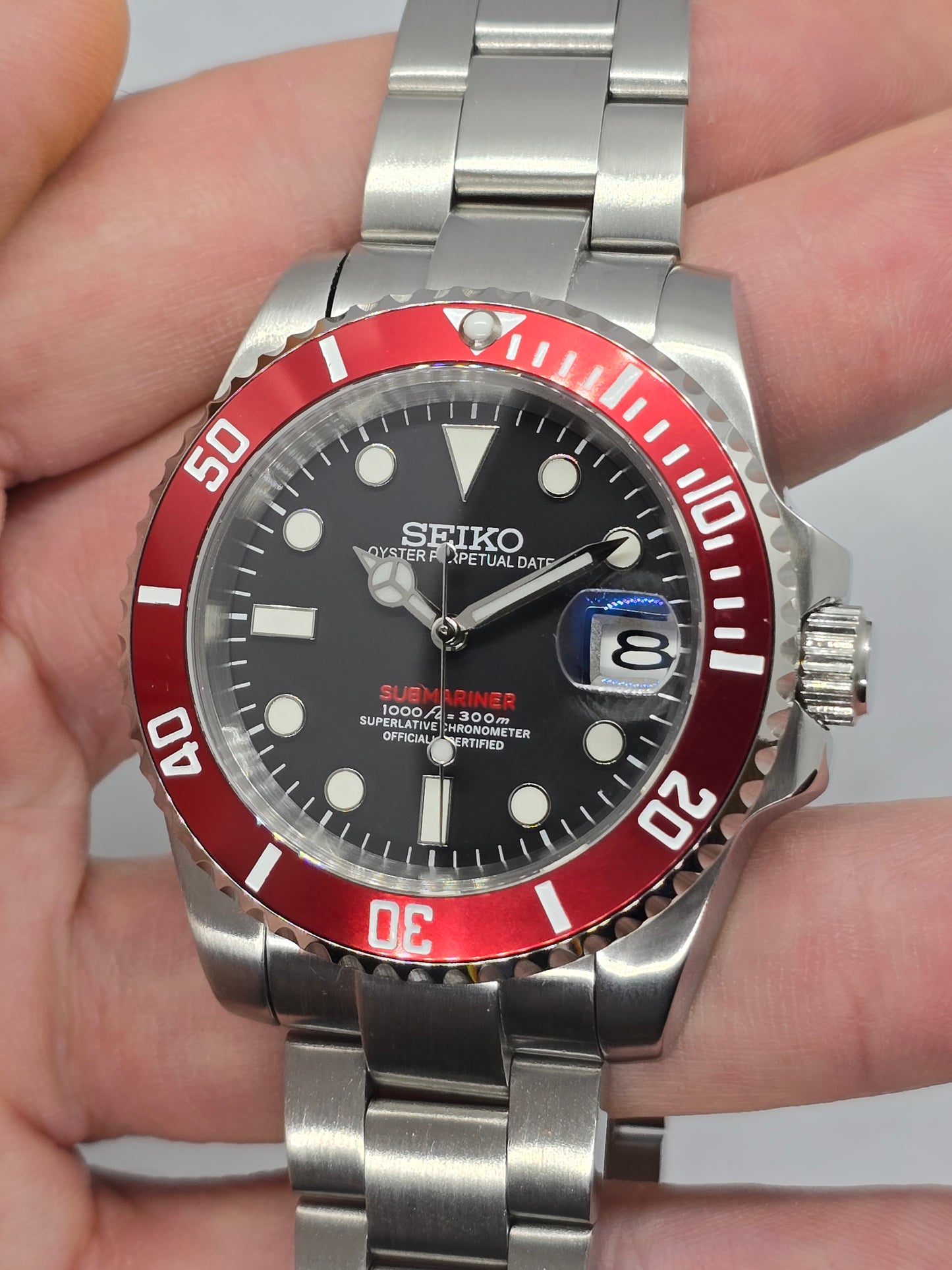 Seiko Mod Submariner Oyster Nh35 automatico 40mm lunetta rossa ceramica