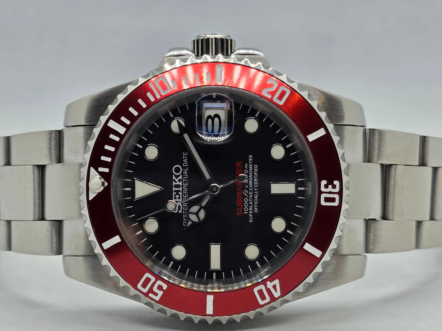 Seiko Mod Submariner Oyster Nh35 automatico 40mm lunetta rossa ceramica