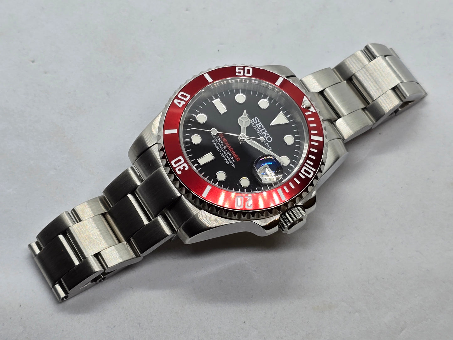 Seiko Mod Submariner Oyster Nh35 automatico 40mm lunetta rossa ceramica