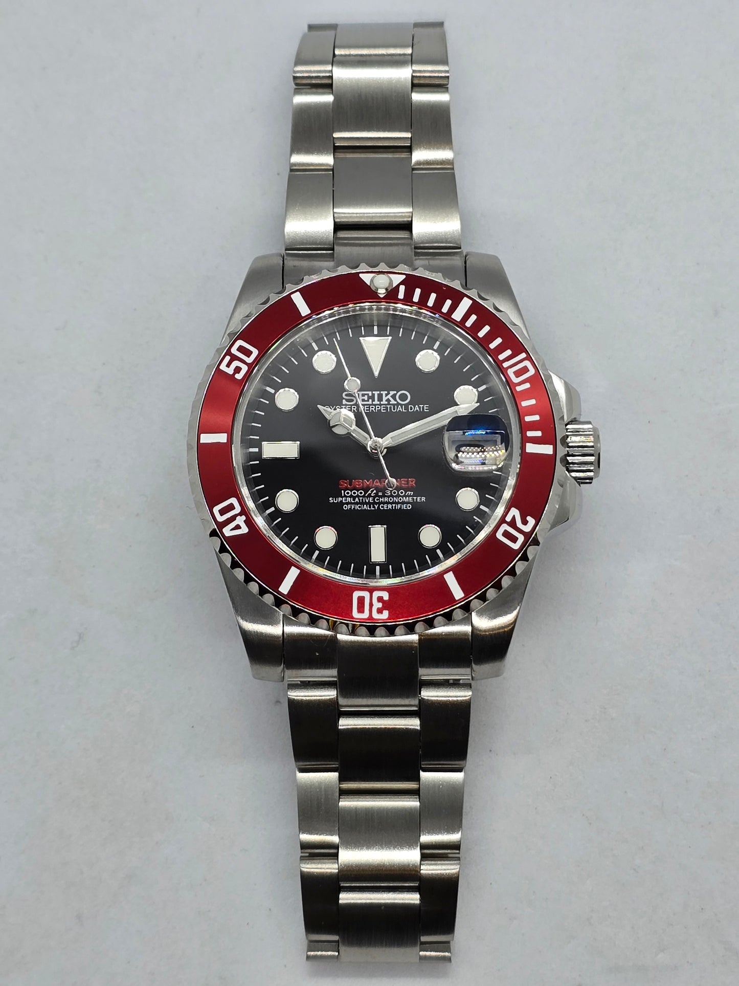 Seiko Mod Submariner Oyster Nh35 automatico 40mm lunetta rossa ceramica