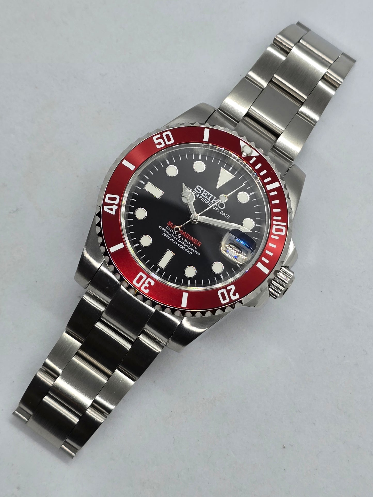 Seiko Mod Submariner Oyster Nh35 automatico 40mm lunetta rossa ceramica