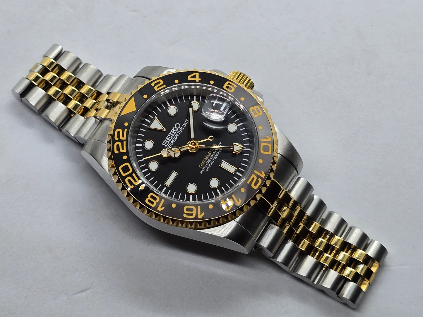 Seiko Mod Gmt acciaio e oro giallo Nh34 automatico 40 mm lunetta ceramica