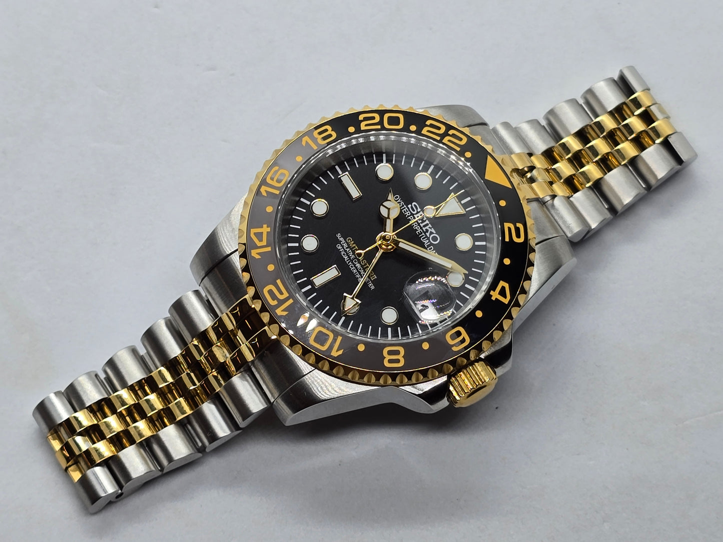 Seiko Mod Gmt acciaio e oro giallo Nh34 automatico 40 mm lunetta ceramica